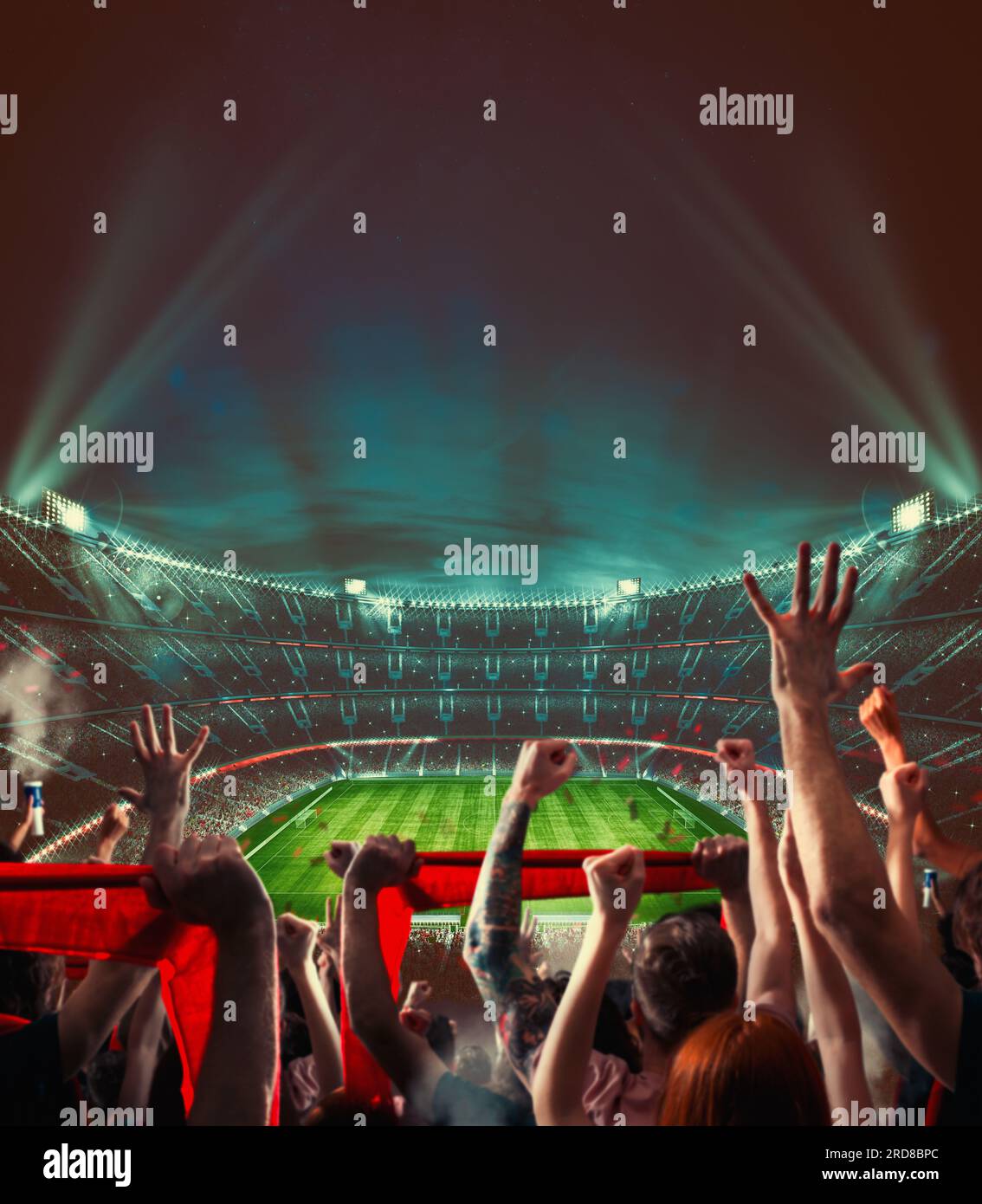 Il calcio di scena a notte con corrispondenza con il tifo tifosi allo stadio Foto Stock