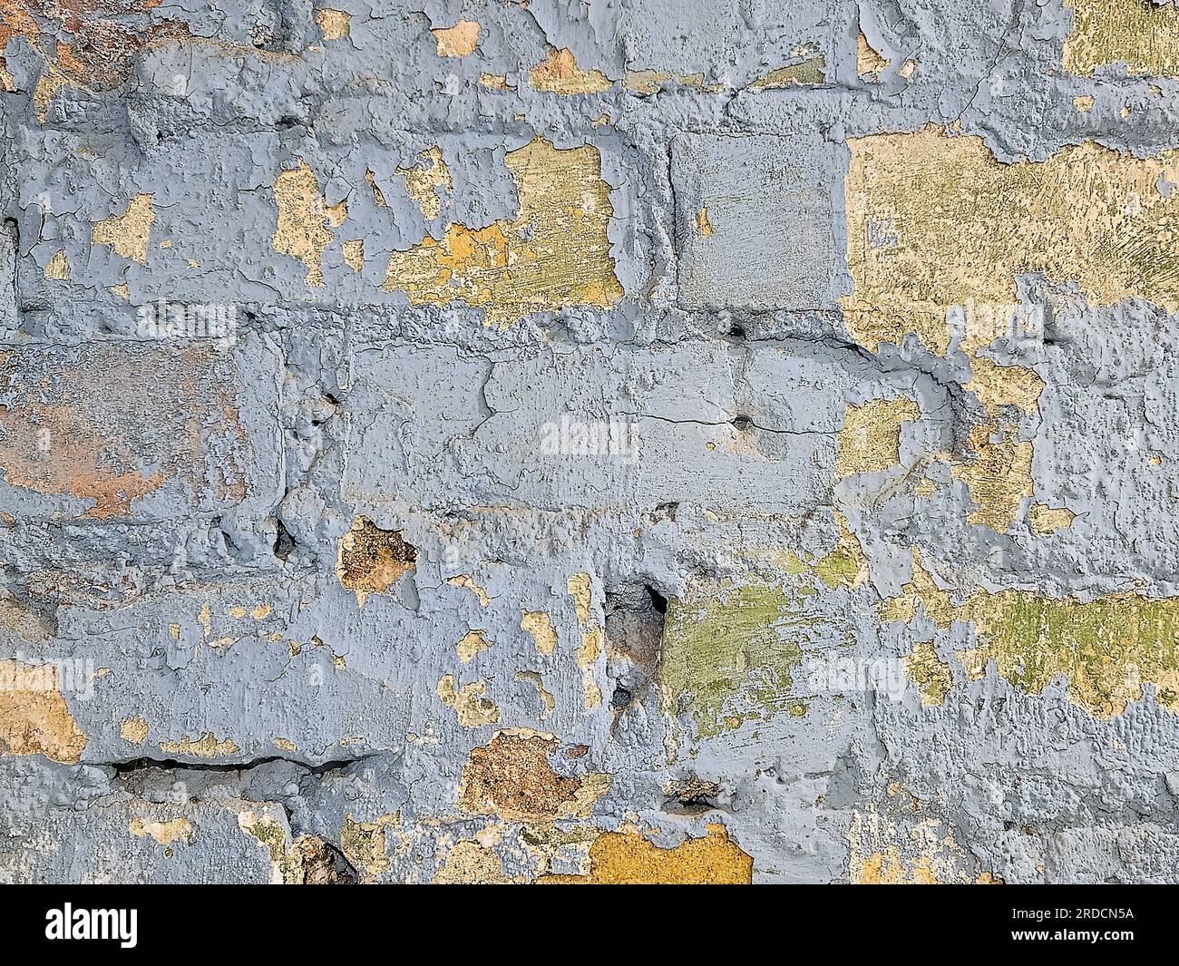 Vecchio muro di mattoni con vernice blu pastello Foto Stock