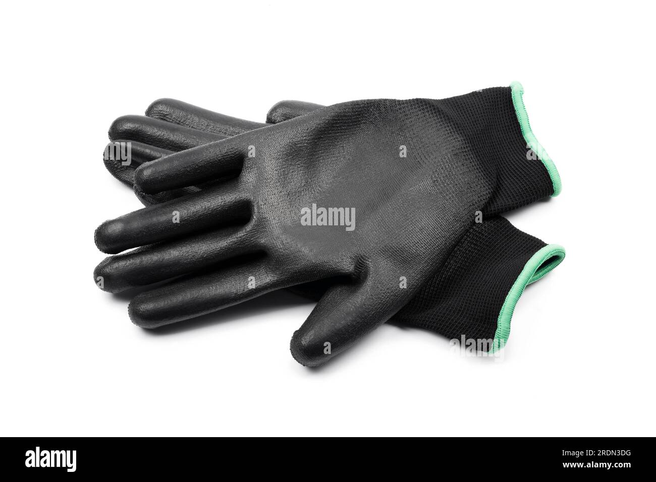 Guanti da lavoro in tessuto nero con gomma isolata su bianco Foto Stock
