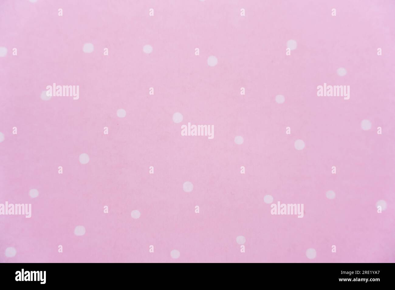 Pois bianco su sfondo rosa. Modello di carta Foto Stock