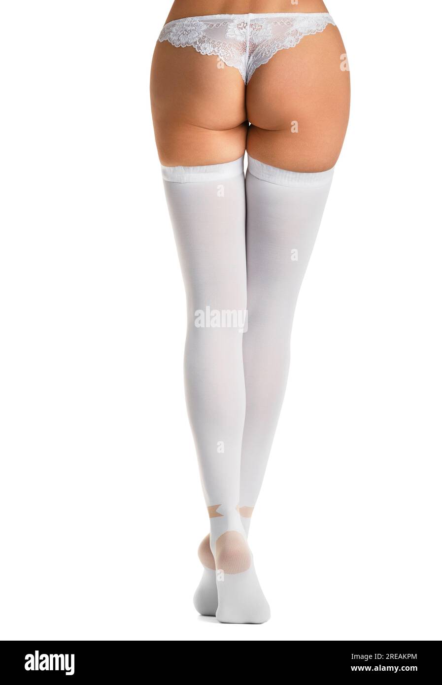 Gambe a compressione bianca calze su fondo bianco, prevenzione del tromboembolismo, trattamento delle vene varicose, terapia venosa Foto Stock