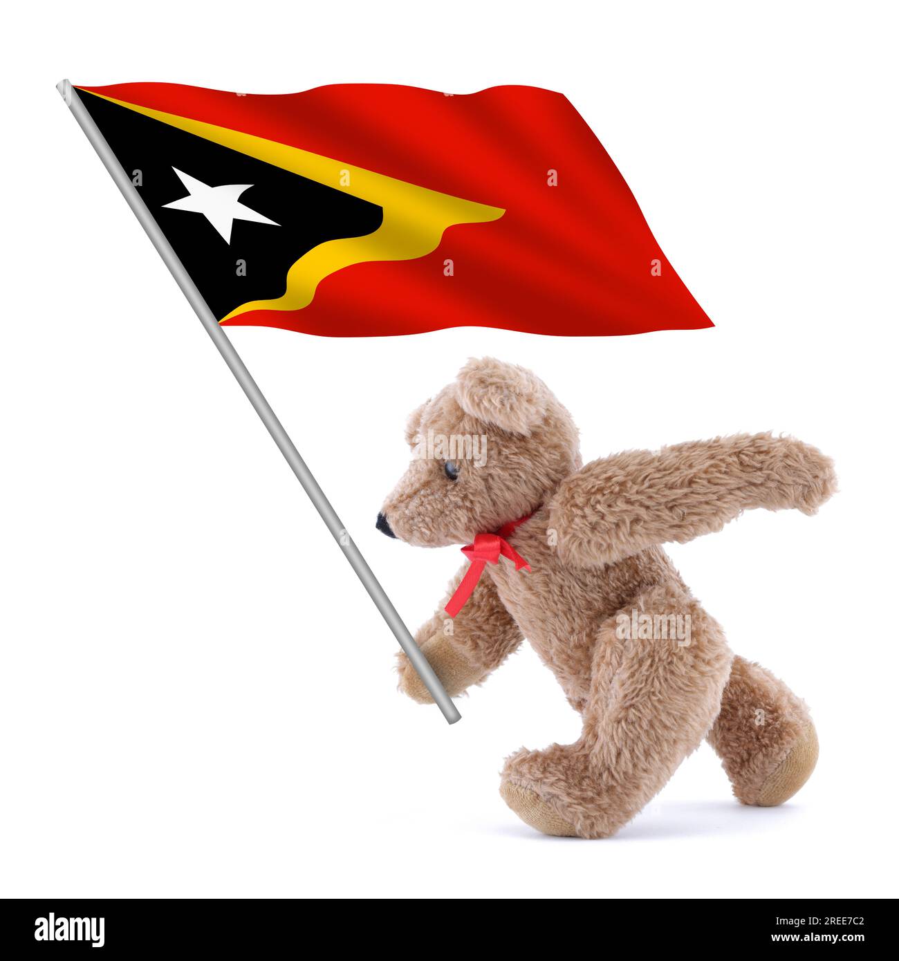 La bandiera di Timor Est è portata da un grazioso orsacchiotto Foto Stock