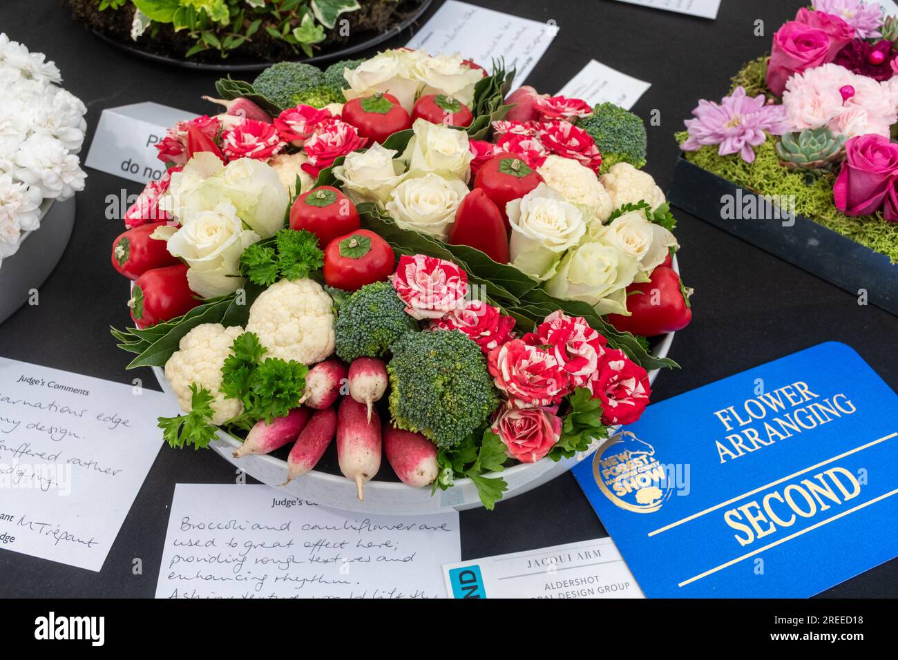 The New Forest and Hampshire County Show in Inghilterra, Regno Unito, luglio 2023. Fiore organizzazione della partecipazione al concorso. Foto Stock