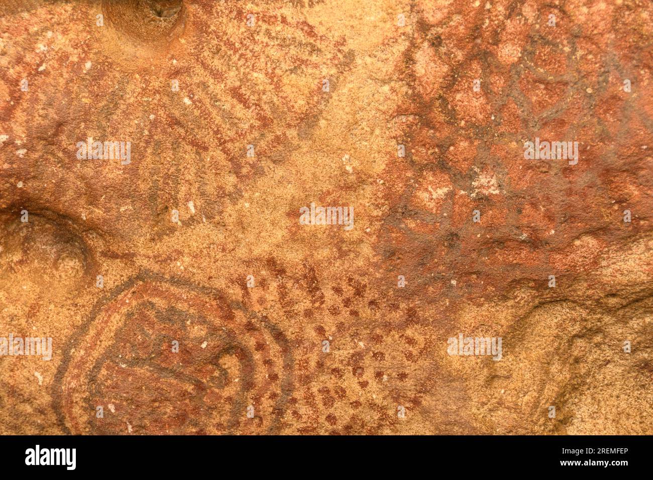 Pittogrammi indiani Onima, disegni colorati di rosso e simboli incisi sul calcare, si dice che siano stati il lavoro degli indiani Arawak. Foto Stock