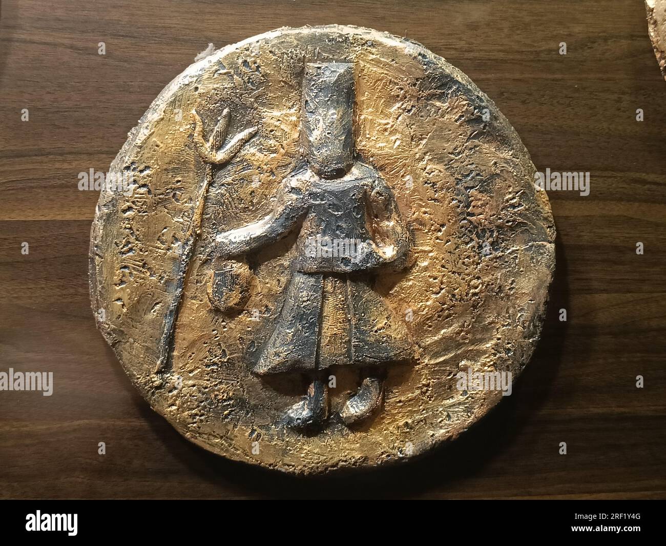 Replica della moneta Kushana. Furono i primi a introdurre monete d'oro in India, stile di imitazione greco-romana Foto Stock