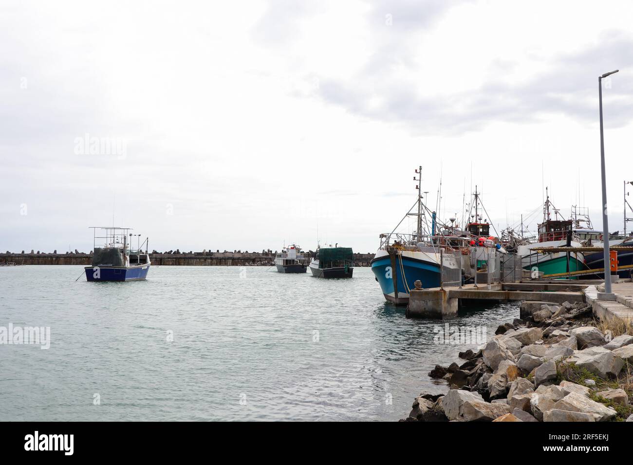 Flotta di barche da pesca a Safe Harbor Foto Stock