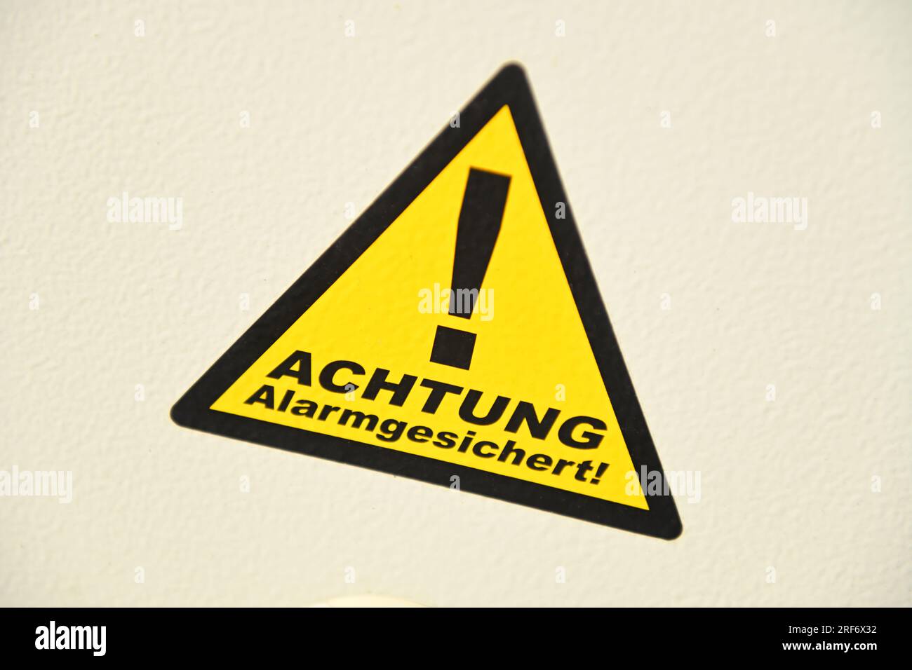 Aufkleber Achtung, alarmgesichert Foto Stock