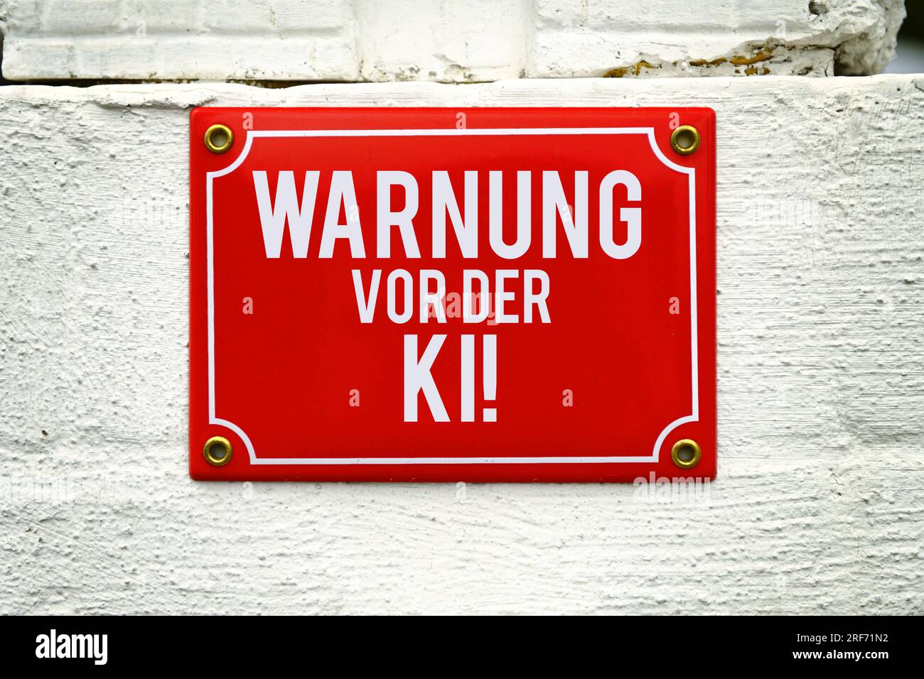 FOTOMONTAGE, Schild mit Aufschrift Warnung vor der KI Foto Stock