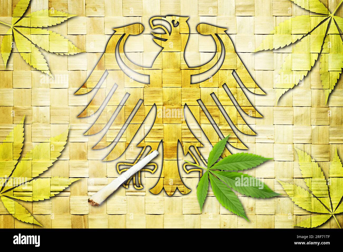 FOTOMONTAGE, Deutscher Bundesadler mit Joint und Cannabisblatt, Symbolfoso Cannabis-Legalisierung Foto Stock
