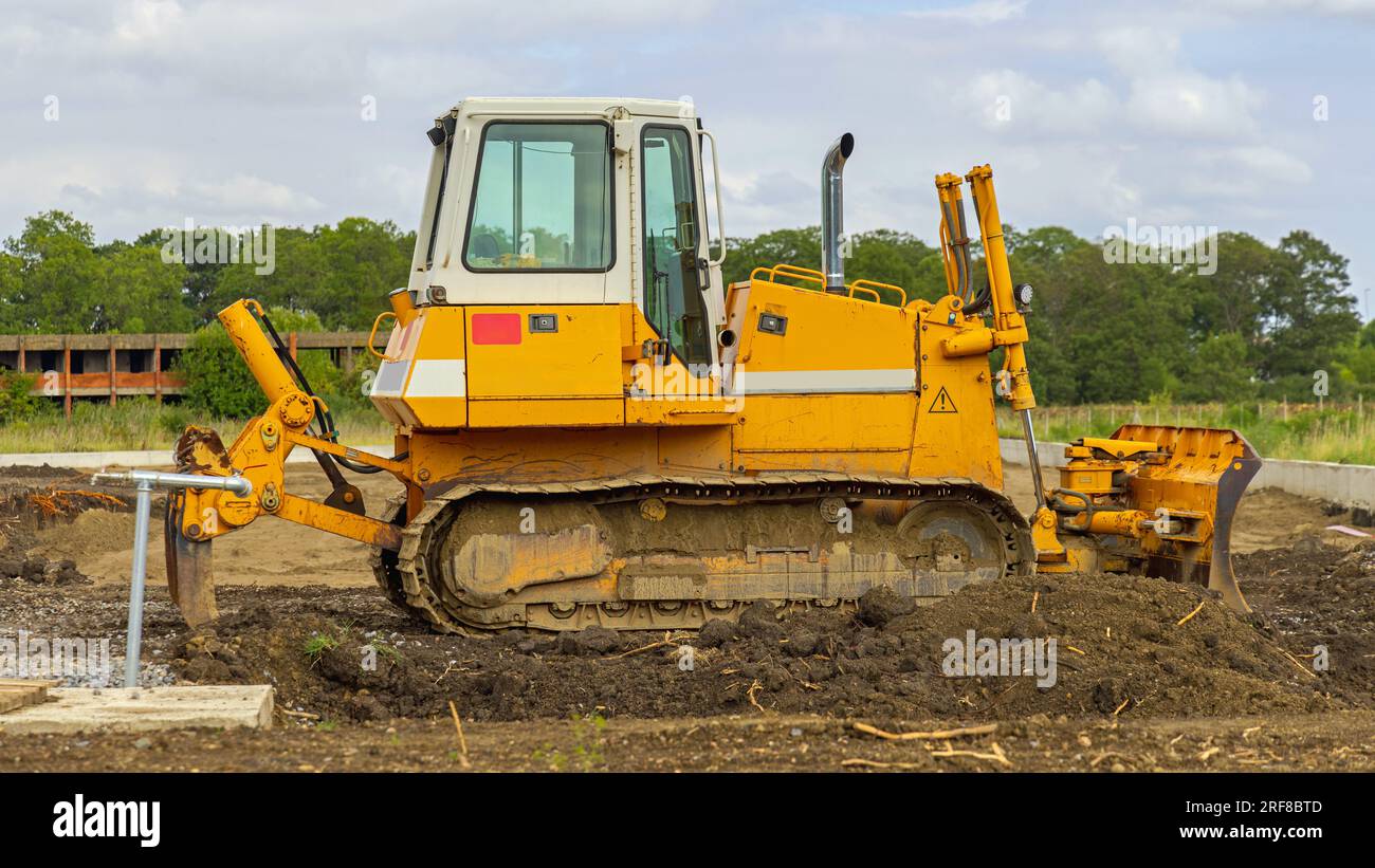 Macchina bulldozer presso New Project Construction Site Ground Works Foto Stock