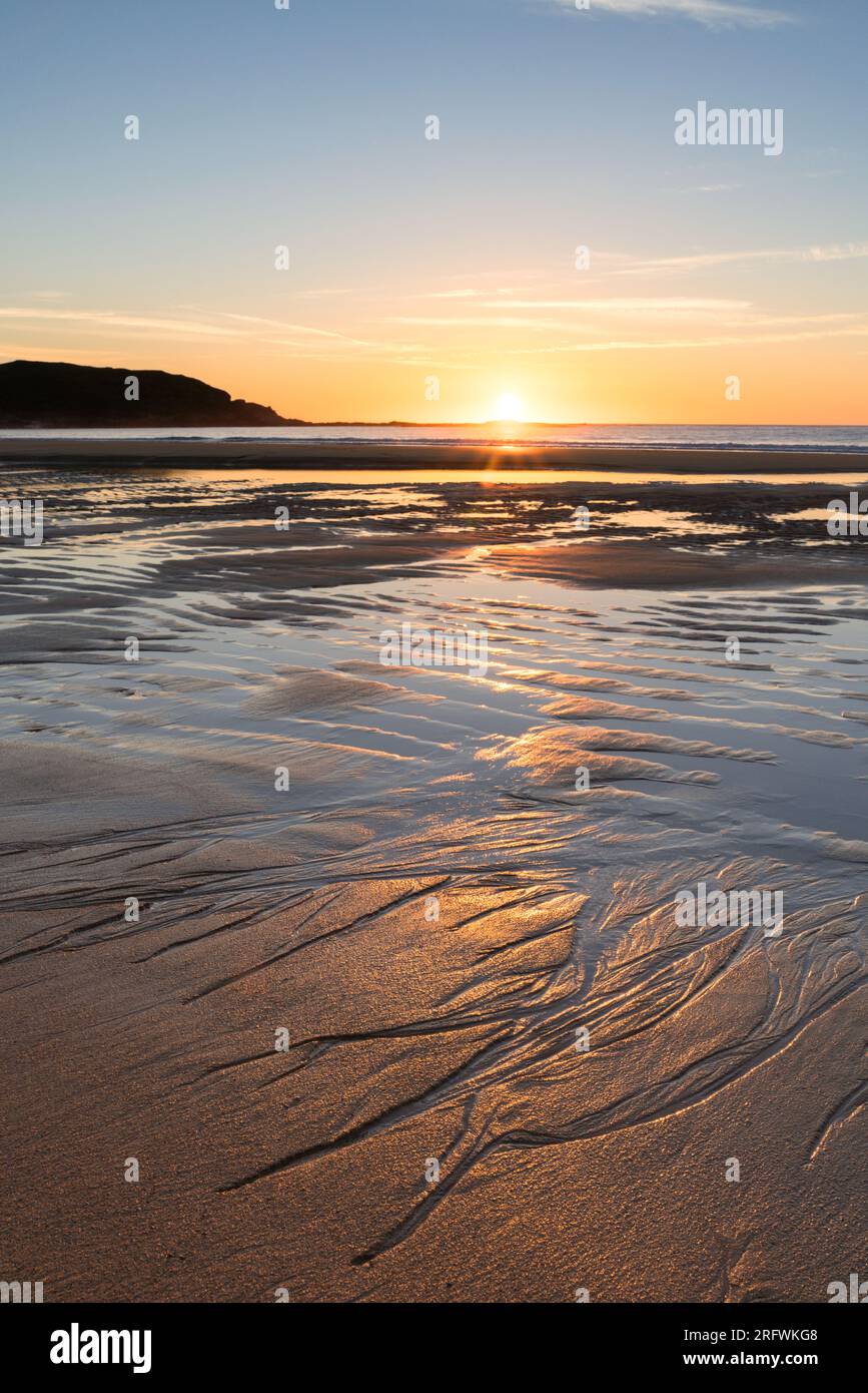 Sunset, Kiloran Bay, Colonsay, Scozia Foto Stock