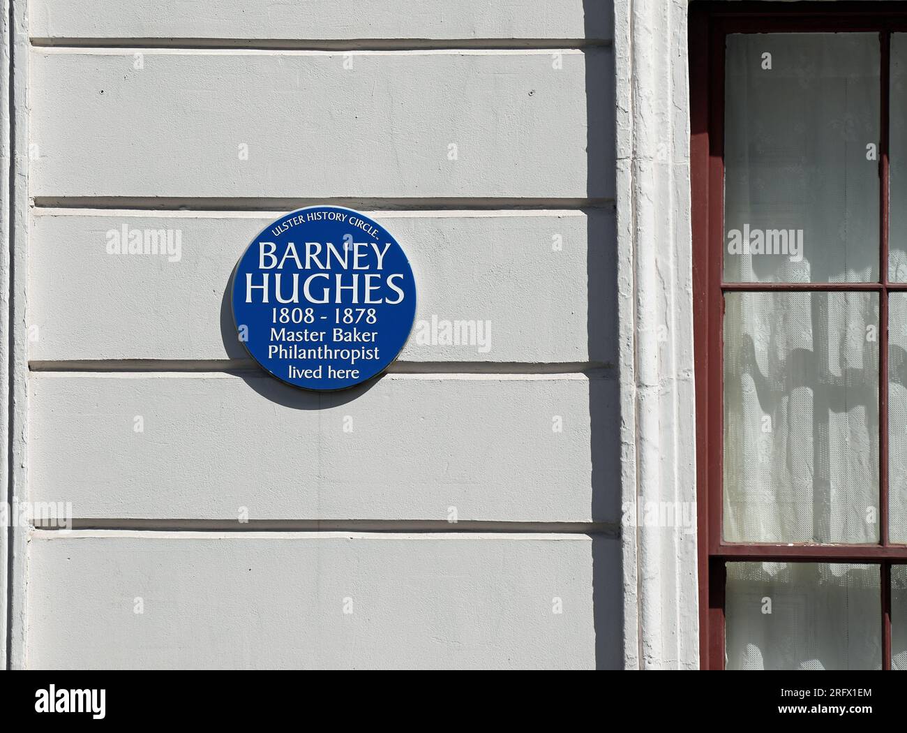 Targa blu Barney Hughes a College Square North a Belfast Foto Stock
