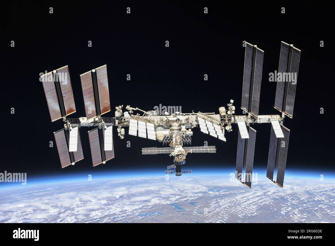 La stazione spaziale Internazionale orbitante sopra la Terra. Foto Stock