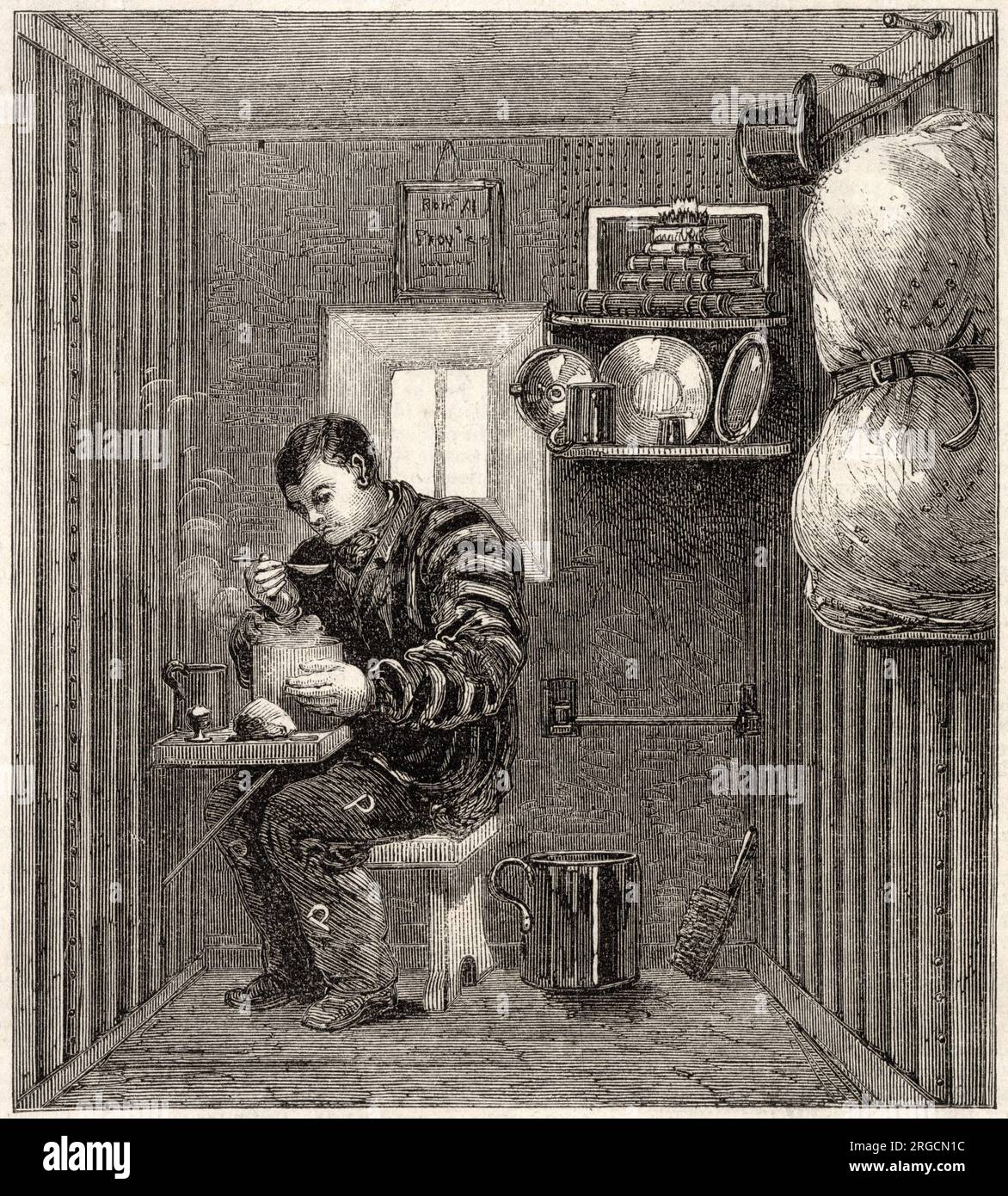 Detenuto che mangia il suo pasto in una cella della prigione di Portland sull'isola di Portland, Dorset, 1863. Foto Stock