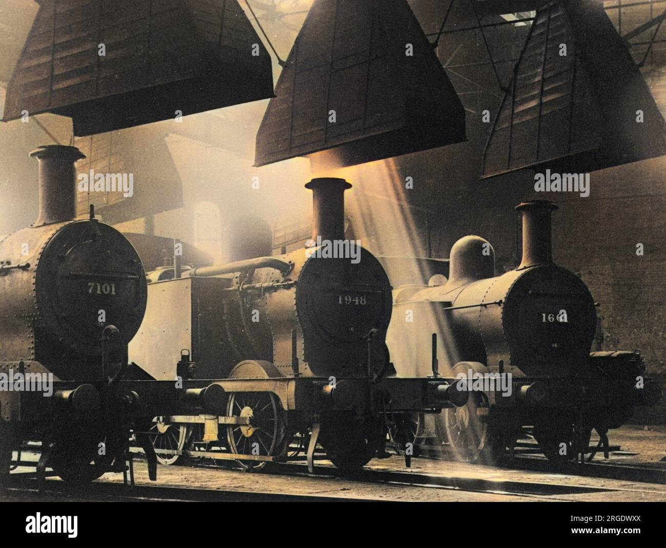 Treni a vapore che si riforniscono nei capannoni dei treni di Kentish Town, Londra Foto Stock