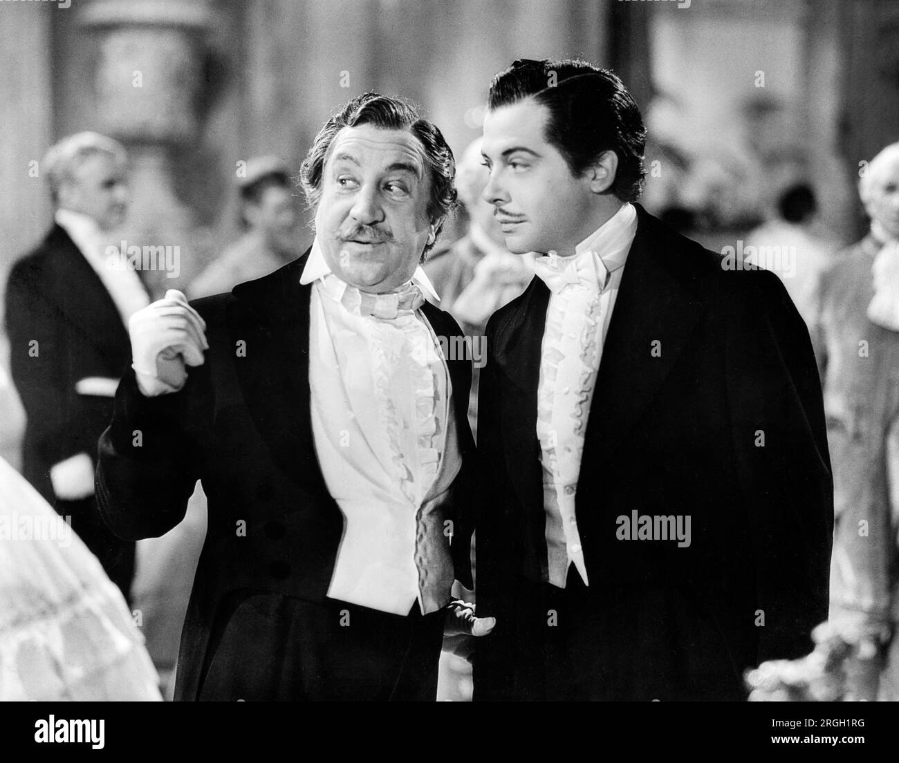Lionel Atwill, Fernand Gravet, sul set del film, 'il grande valzer', MGM, 1938 Foto Stock