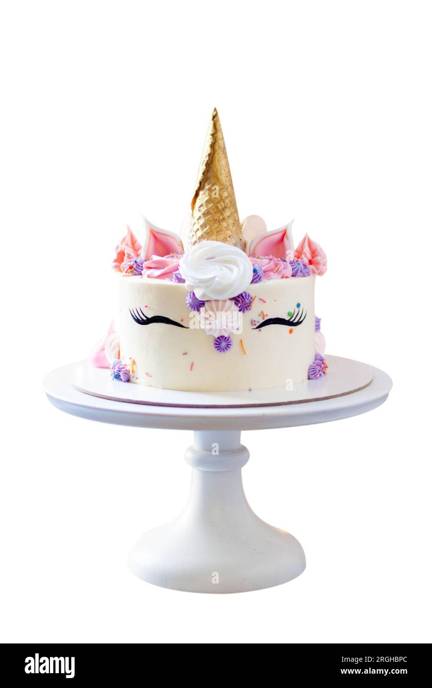 Splendida torta unicorno con corno di cialde dorate, ciglia e