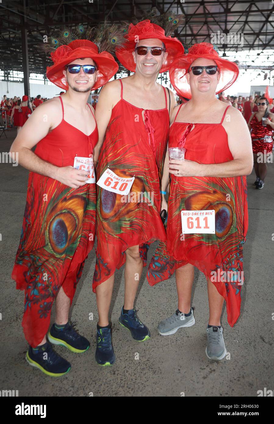 New Orleans, USA. 12 agosto 2023. I partecipanti all'evento partecipano alle attività Red Dress Run presso il Mandeville Shed di New Orleans, Louisiana, sabato 12 agosto 2023. (Foto di Peter G. Forest/Sipa USA) credito: SIPA USA/Alamy Live News Foto Stock