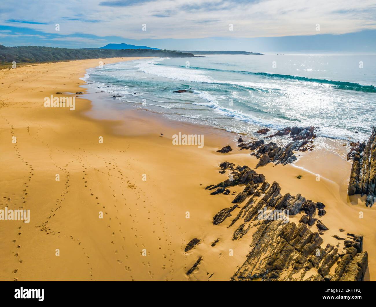 Esplorare Cuttagee Beach sulla costa della costa di Sapphire, nella costa meridionale del New South Wales, Australia Foto Stock