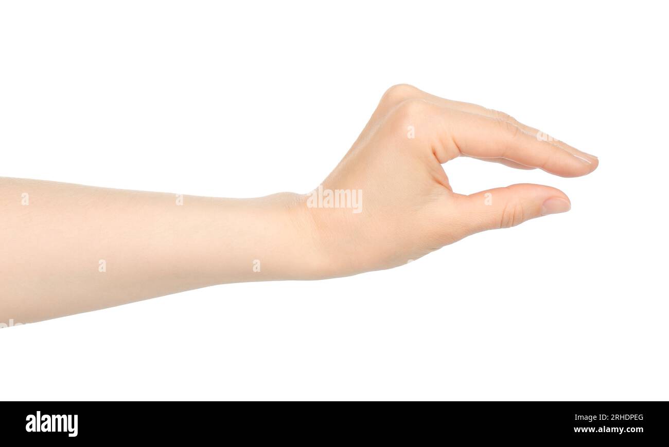 La mano di una donna mostra qualcosa in mano virtuale, in primo piano su sfondo bianco Foto Stock