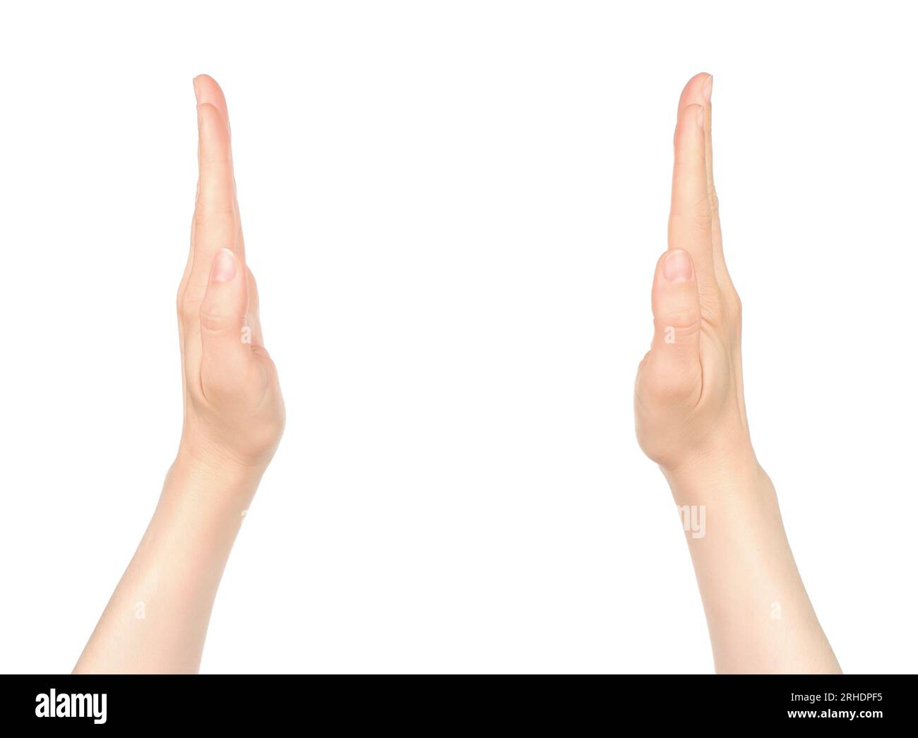 Le mani delle donne mostrano qualcosa in mano virtuale, su sfondo bianco in primo piano Foto Stock