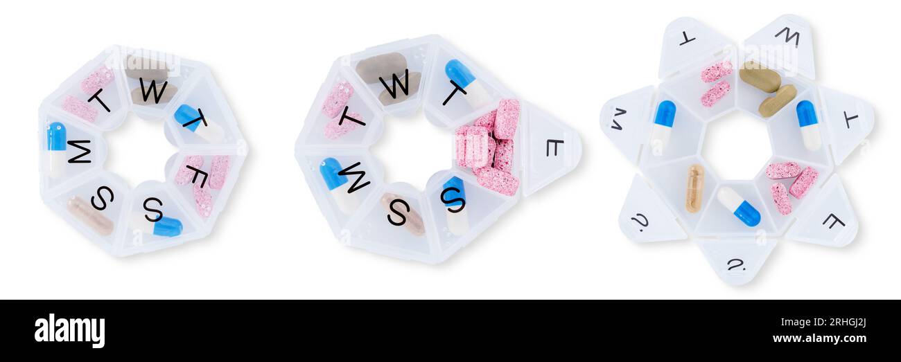 Set di pillole colorate per capsule in scatola di plastica. Industria farmaceutica. Sanità e medicina. Concetto di vitamine e integratori. Foto Stock