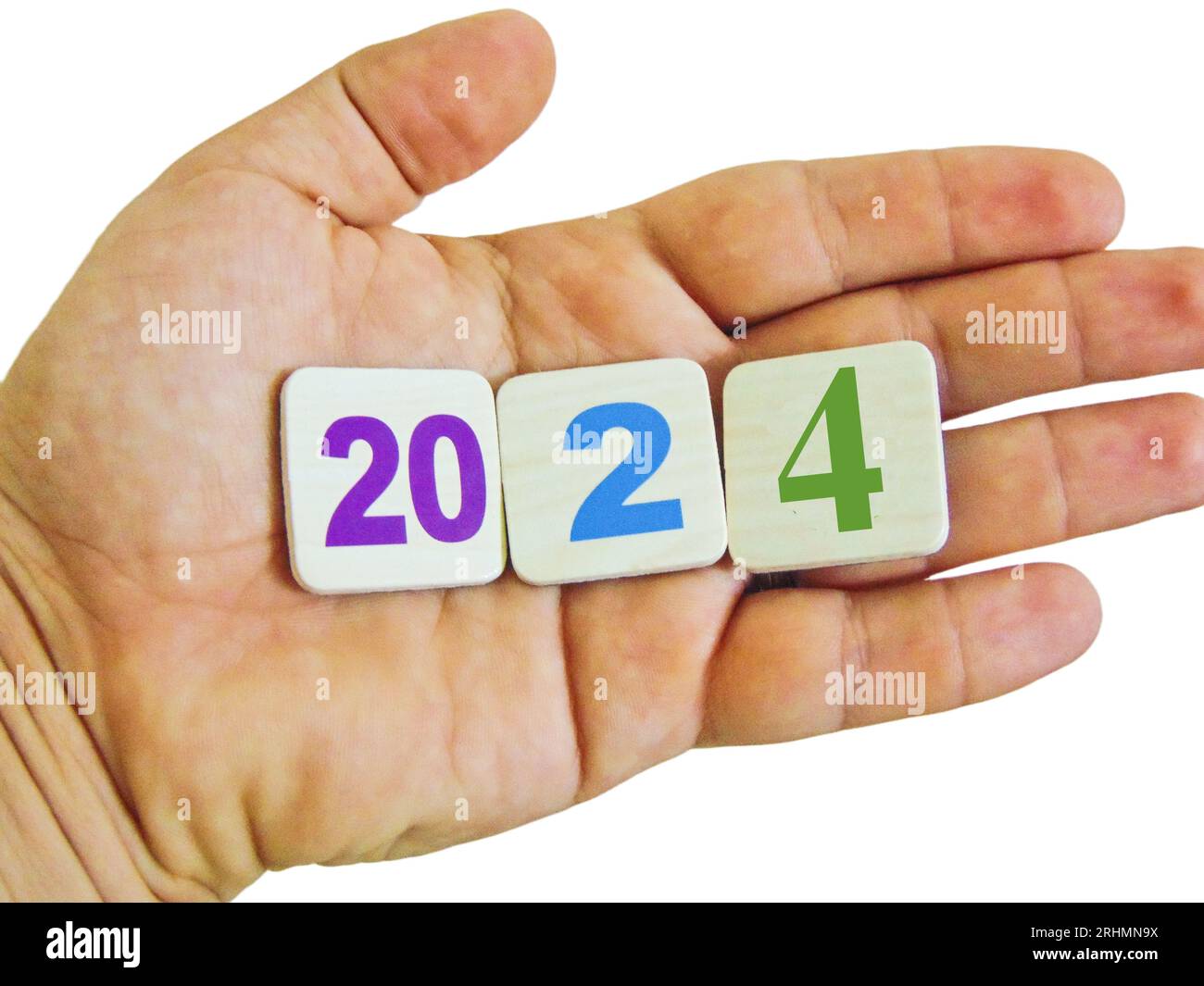 L'anno 2024 sta per arrivare. Una persona tiene numeri che formano l'anno 2024 nel suo palmo Foto Stock