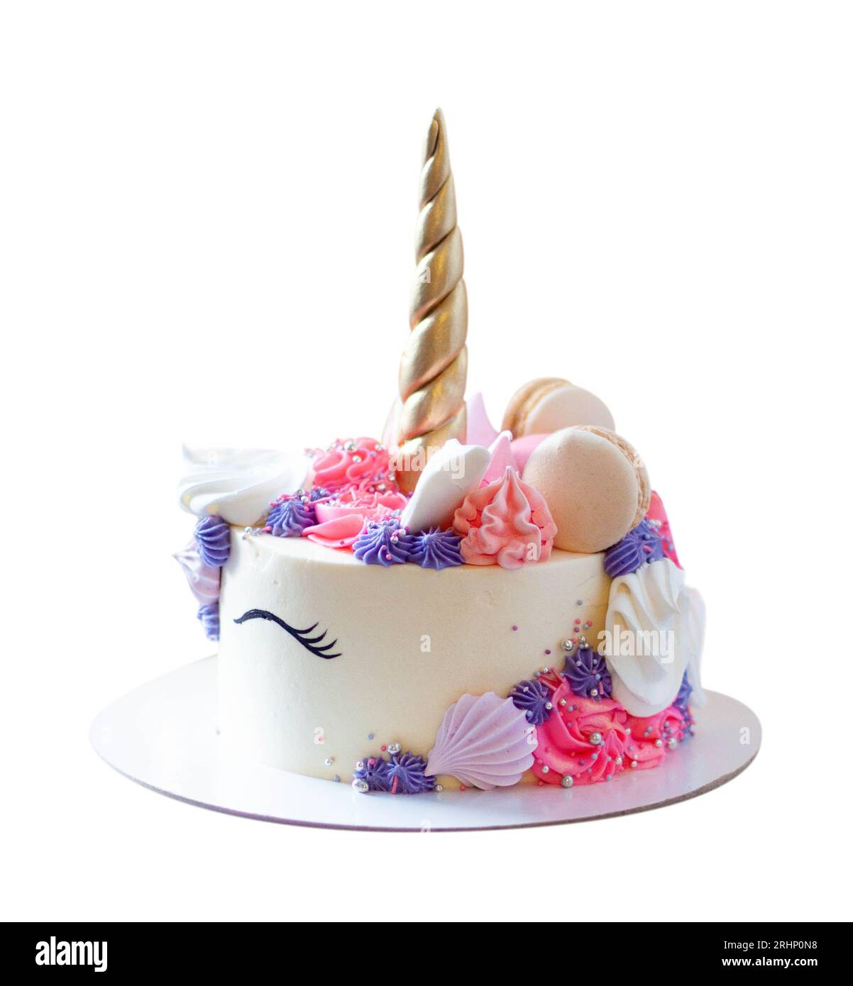 Splendida torta unicorno con corno di cialde dorate, ciglia e formaggio  cremoso congelato su sfondo bianco Foto stock - Alamy