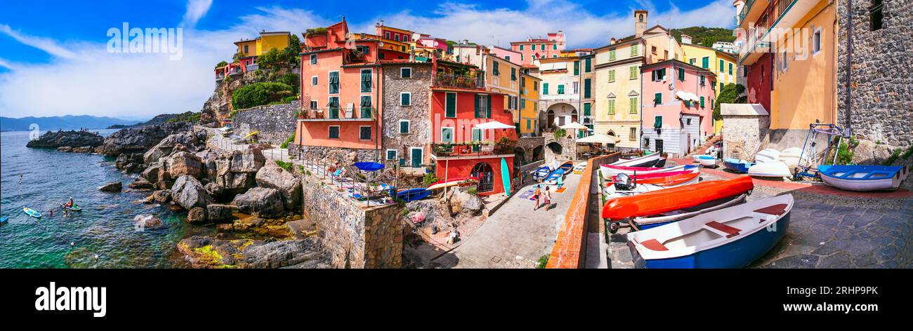 Italia, Liguria. Pittoresco e colorato villaggio tradizionale di Tellaro con vecchie barche da pesca. Provincia di la Spezia Foto Stock