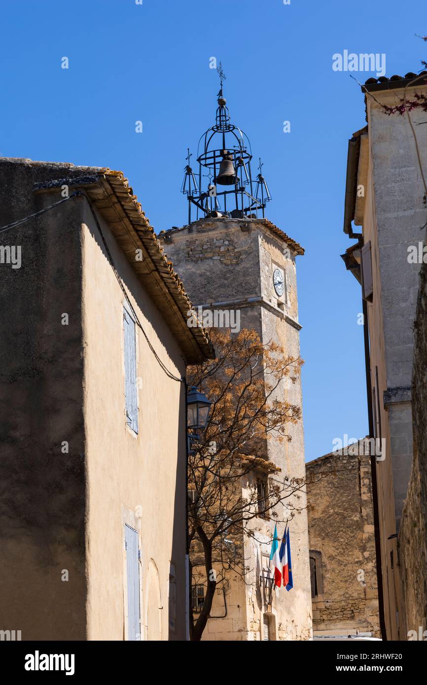 La torre dell'orologio del XVI secolo a Ménerbes, Vaucluse, Provenza, Francia Foto Stock