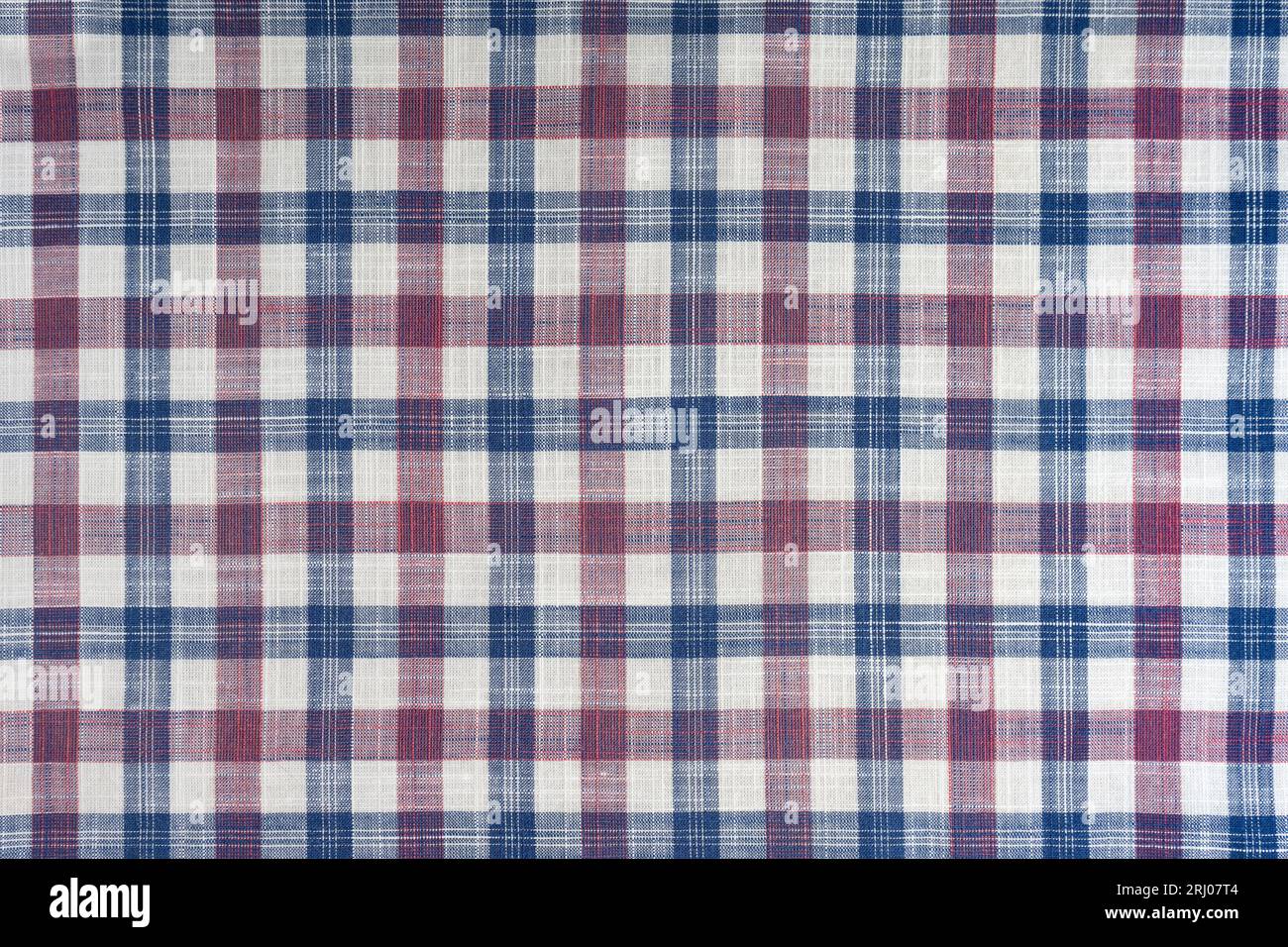 Tessuto a scacchi blu e rosa, motivo tartan. Tessuto camicia, tessuto tovagliato, tela a quadri in lino, motivo a quadri scozzese classico. Sfondo, Foto Stock