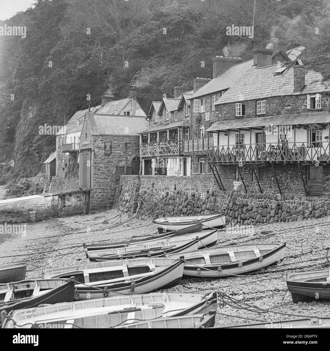 Una fotografia in bianco e nero dei primi anni del XX secolo di Clovelly nel Devon, in Inghilterra. Foto Stock