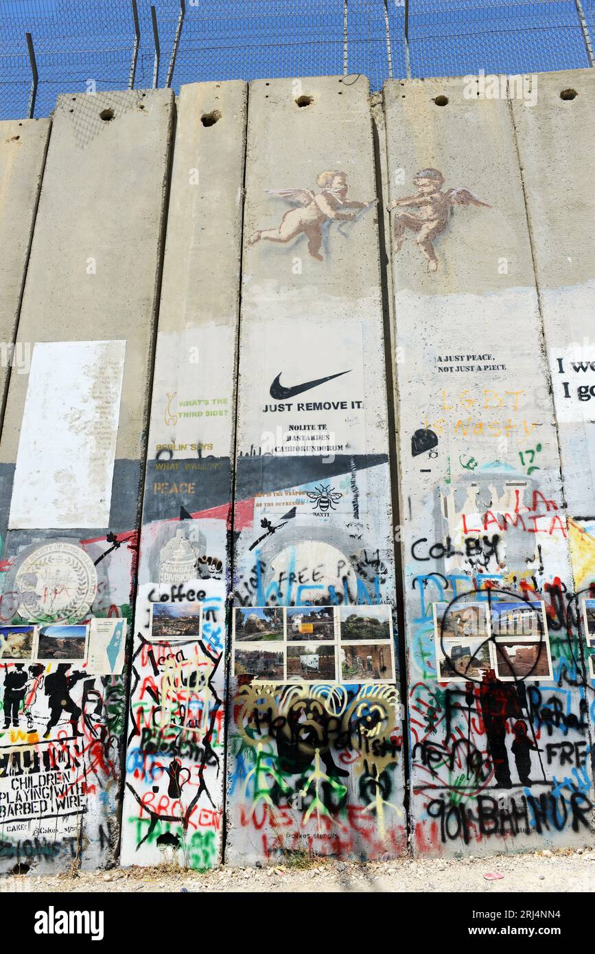 Murales sulla barriera di sicurezza israeliana a Betlemme, Palestina. Foto Stock