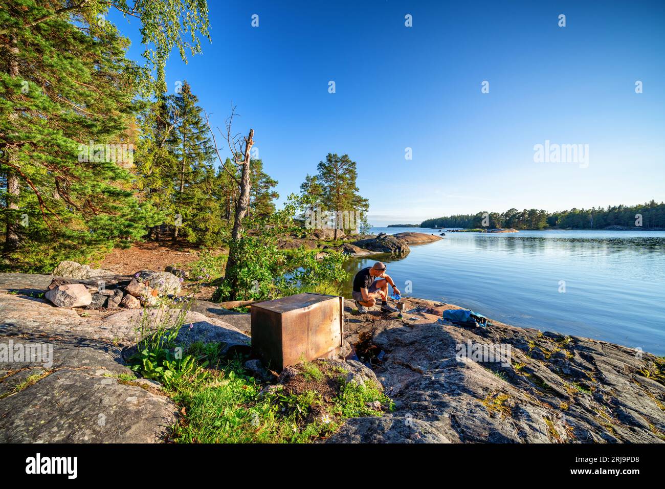 Avvio di una pentola a gas sull'isola di Linlo, Kirkkonummi, Finlandia Foto Stock