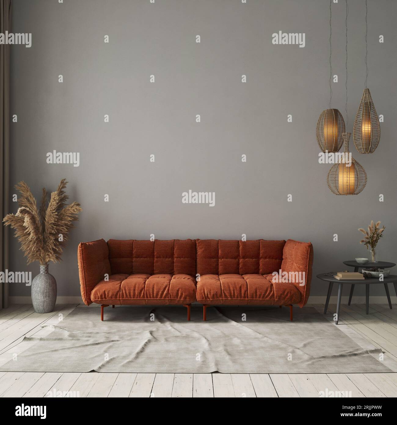Interno del soggiorno con divano arancione su sfondo grigio in cemento. Mockup interno Foto Stock