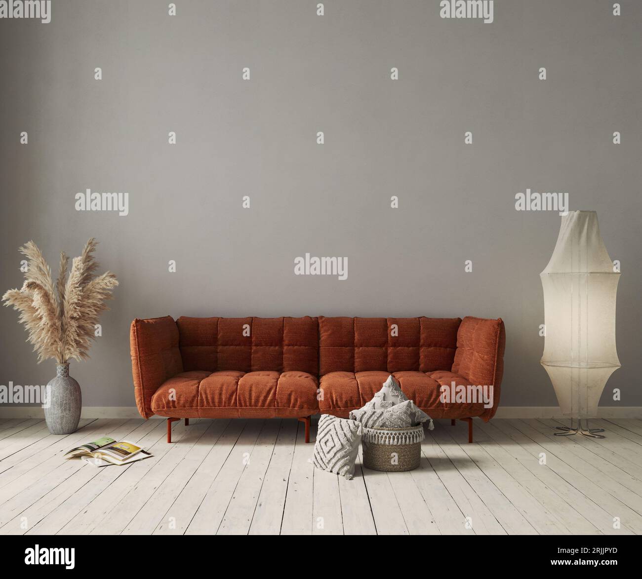 Interno del soggiorno con divano arancione su sfondo grigio in cemento. Mockup interno Foto Stock