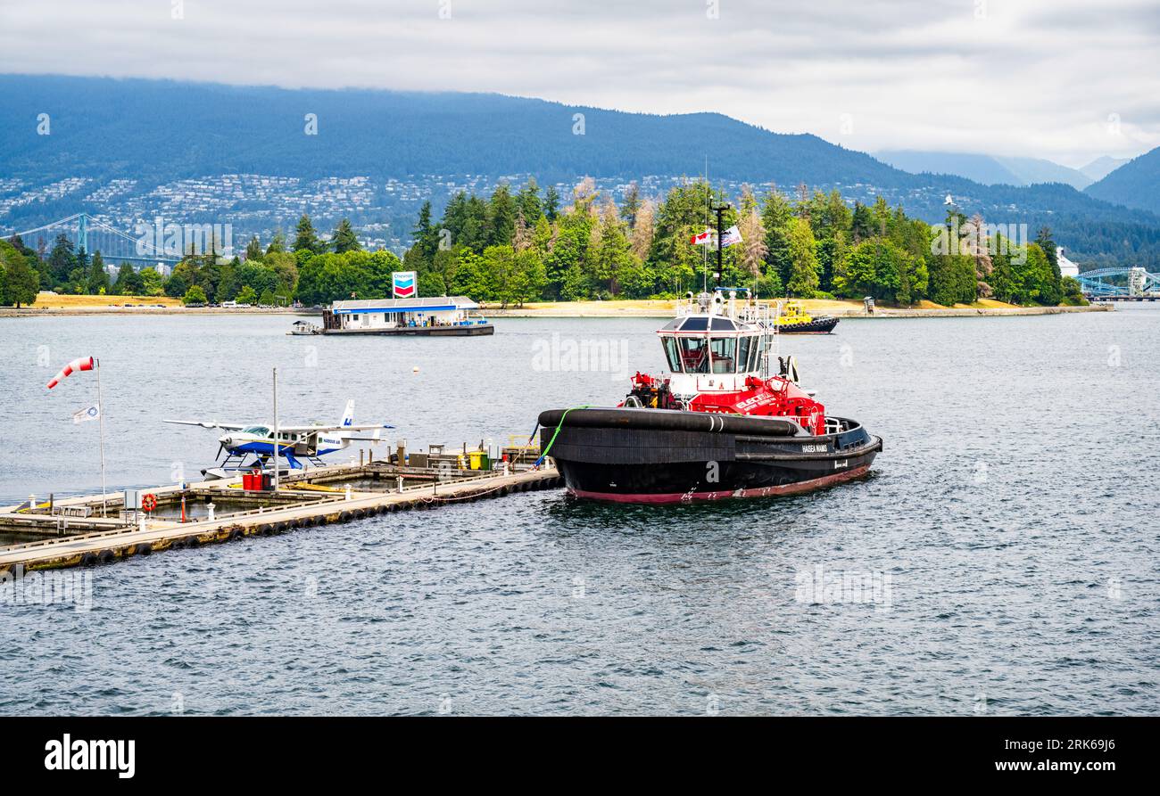 Haisea Wamis è il primo rimorchiatore completamente elettrico al mondo, visto qui al Vancouver Harbour Flight Centre, British Columbia, Canada. Foto Stock