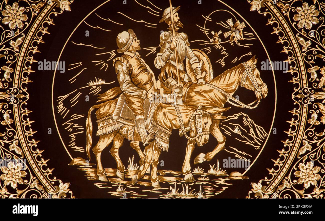 TOLEDO - 8 MARZO: Dettaglio della tipica piastra di damaschi con il Don Chisciotte e Sancho Panza. Artigianato tradizionale con metallo. Foto Stock