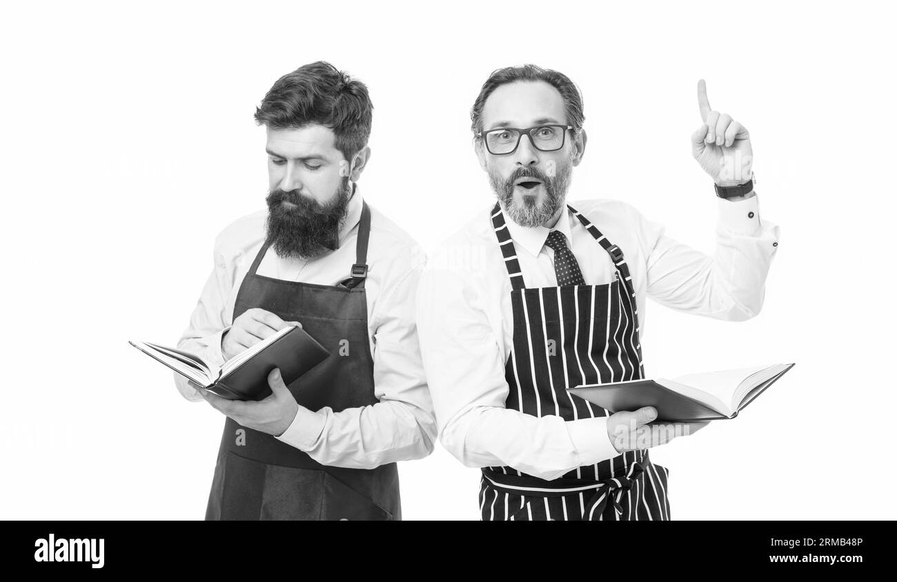 cucina casalinga ispirata. Ingredienti culinari. Catering business. piano dei posti a sedere. Barbani con ricettario. Menu di pianificazione. Buon chef team Foto Stock