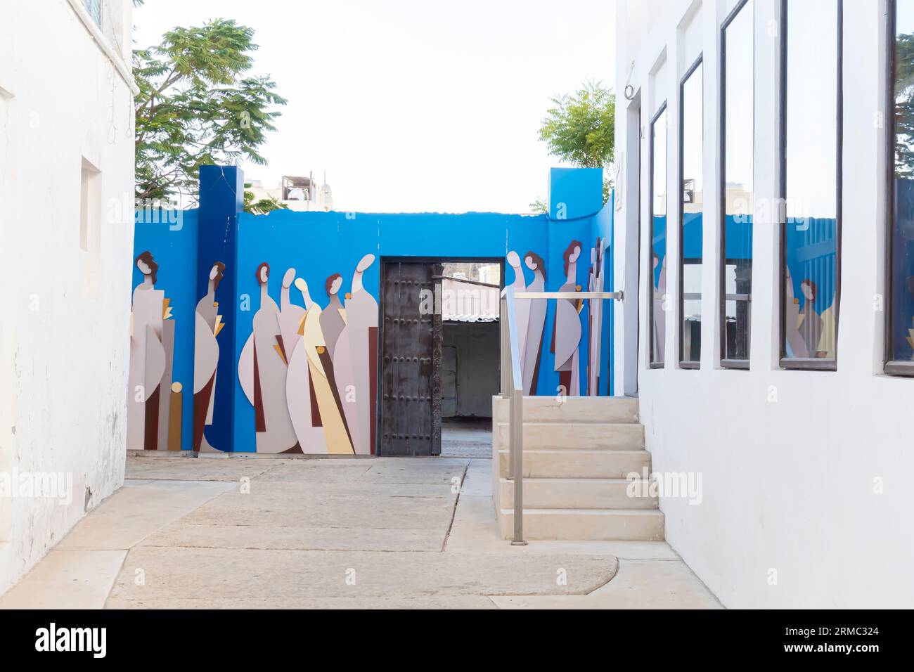 Murale raffigurante donne arabe a Muharraq Bahrain Foto Stock