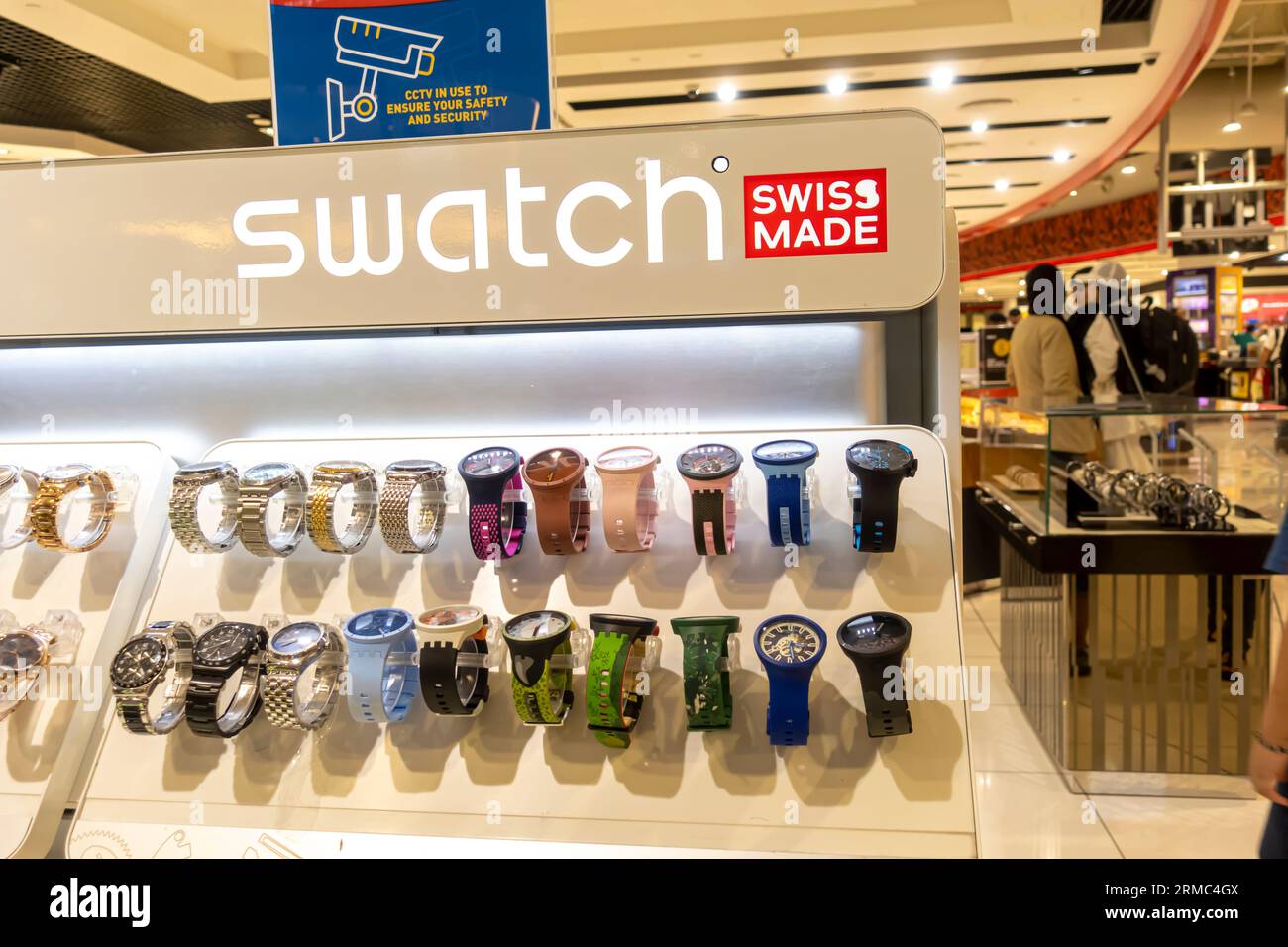 SWATCH orologi svizzeri stand duty free dell'aeroporto di Dubai Foto Stock