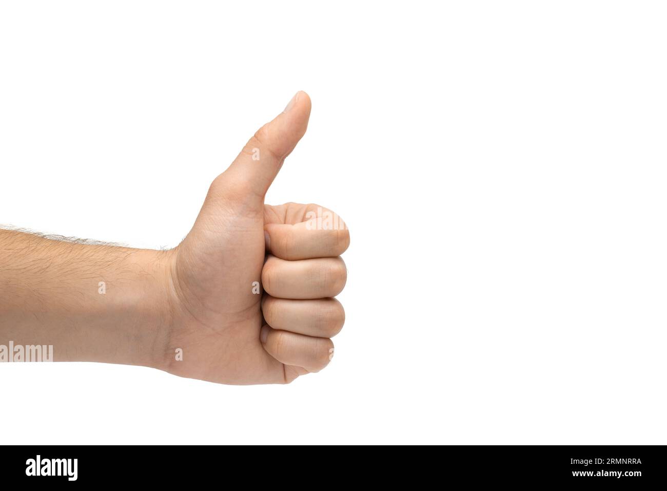 Mano maschile che mostra come, gesto della mano - pollice in alto, mano maschile che mostra pollice in alto Foto Stock