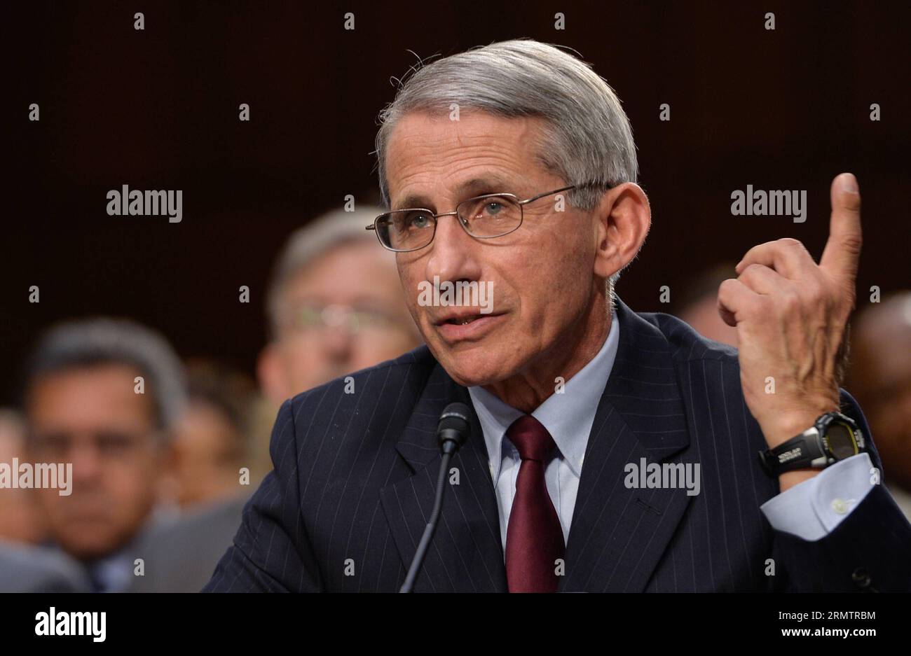 (140917) -- WASHINGTON D.C., -- Dott. Anthony Fauci, direttore del National Institute of Allergy and Infectious Diseases, testimonia davanti al Senato per la salute, l'istruzione, il lavoro e le pensioni Committee e la sottocommissione per gli stanziamenti del Senato sul lavoro, la salute e i servizi umani, e l'istruzione durante un'audizione congiunta sull'Ebola nell'Africa occidentale a Capitol Hill a Washington D.C., capitale degli Stati Uniti, 16 settembre 2014. L'epidemia di Ebola nell'Africa occidentale sta crescendo fuori controllo e rappresenta una potenziale minaccia per la sicurezza globale, il presidente degli Stati Uniti Barack Obama ha avvertito martedì. Bao Dandan) U.S.-WASHIN Foto Stock