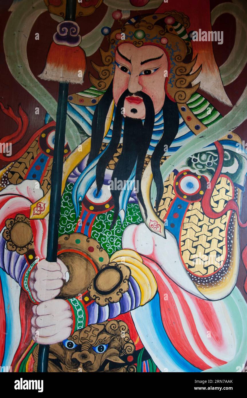 Arte religiosa in un tempio taoista cinese a Kuching, Sarawak, Borneo malese Foto Stock