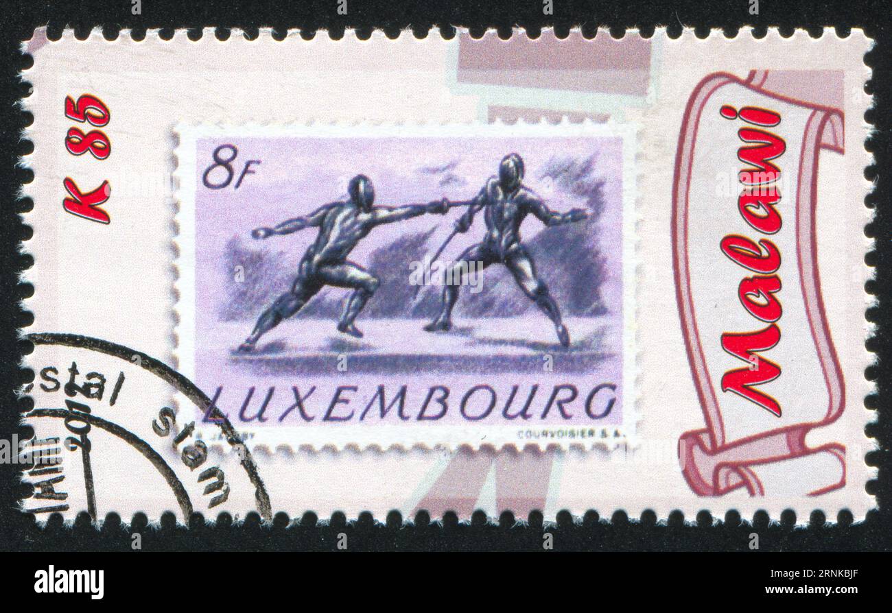 MALAWI - CIRCA 2012: Timbro stampato da Malawi, mostra scherma, circa 2012 Foto Stock