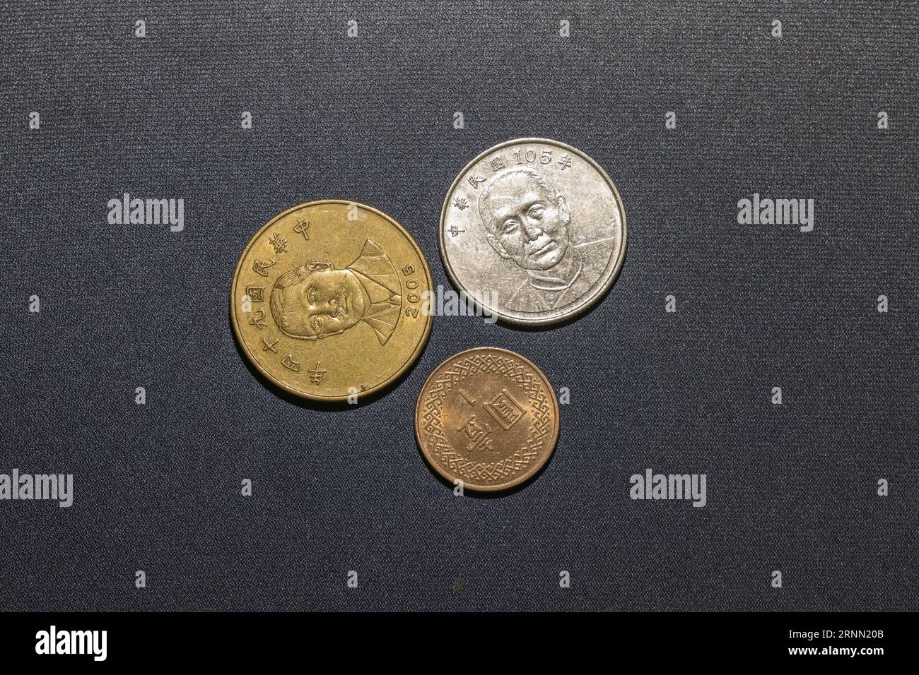 Monete nuovo dollaro di Taiwan Foto Stock