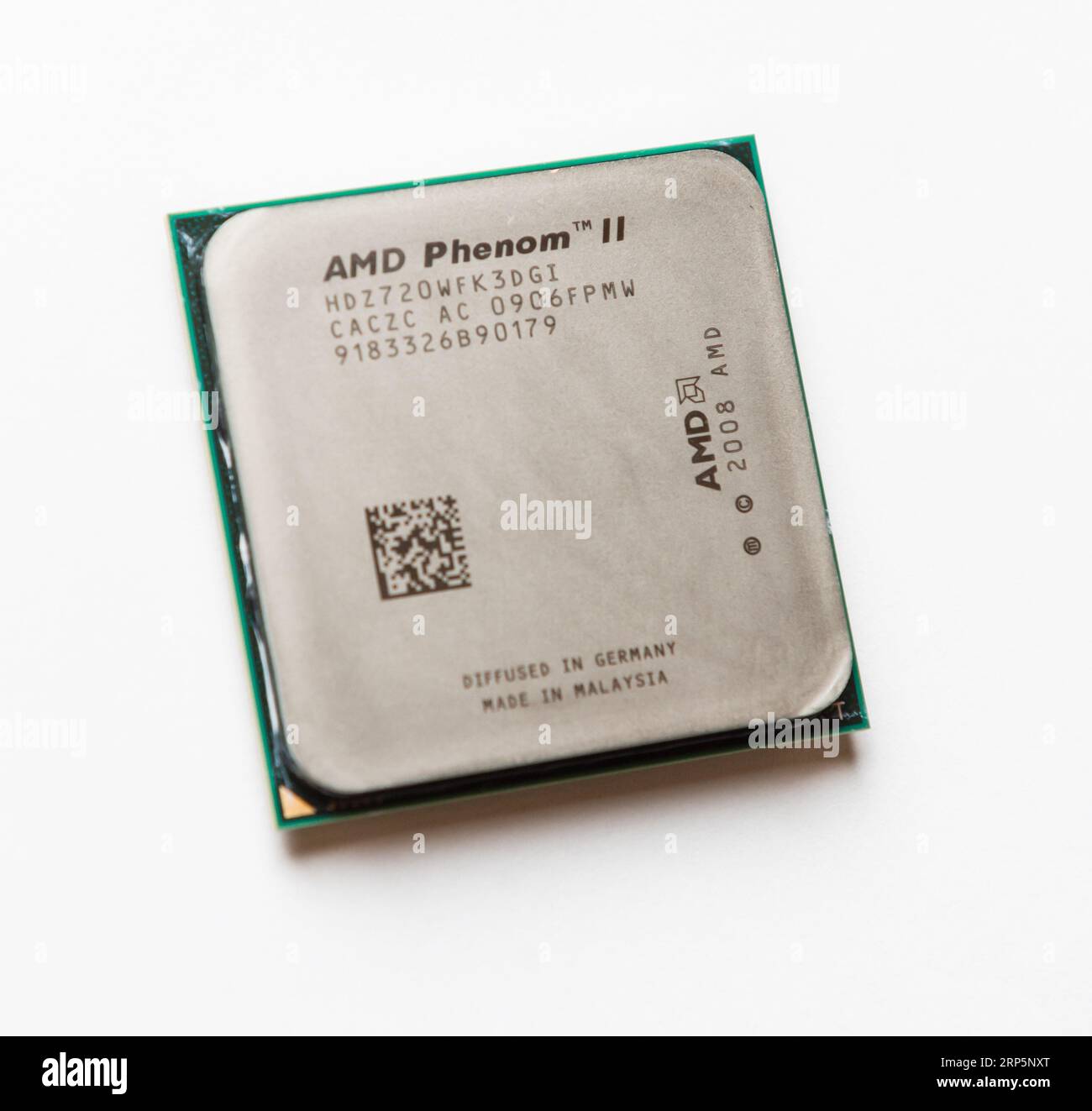 Gothenburg, Svezia - 08 marzo 2014: CPU AMD Phenom II su sfondo bianco. Foto Stock