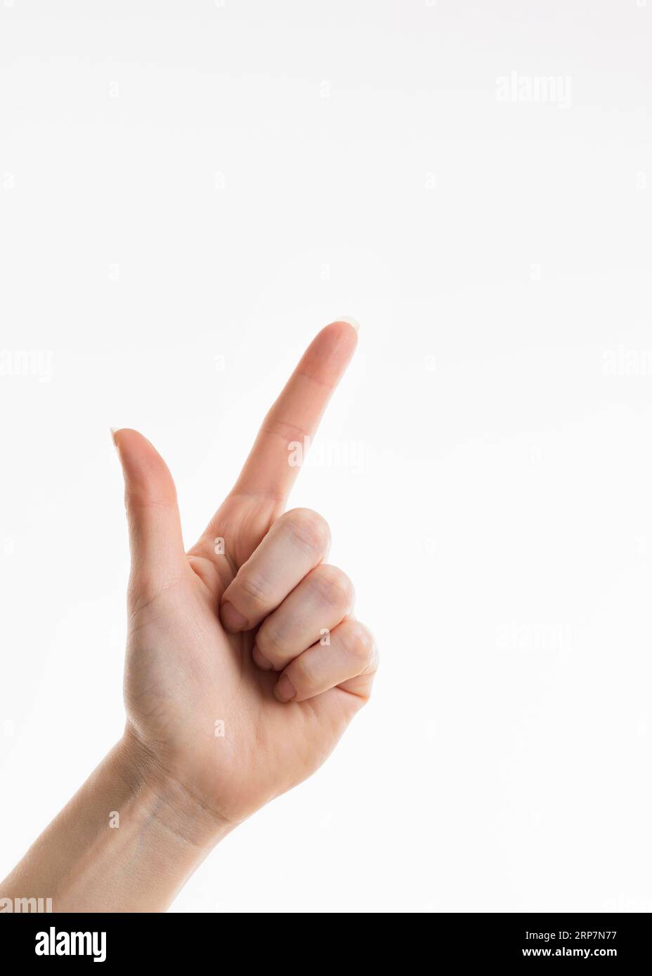 Vista frontale con la mano rivolta verso l'angolo superiore destro Foto Stock