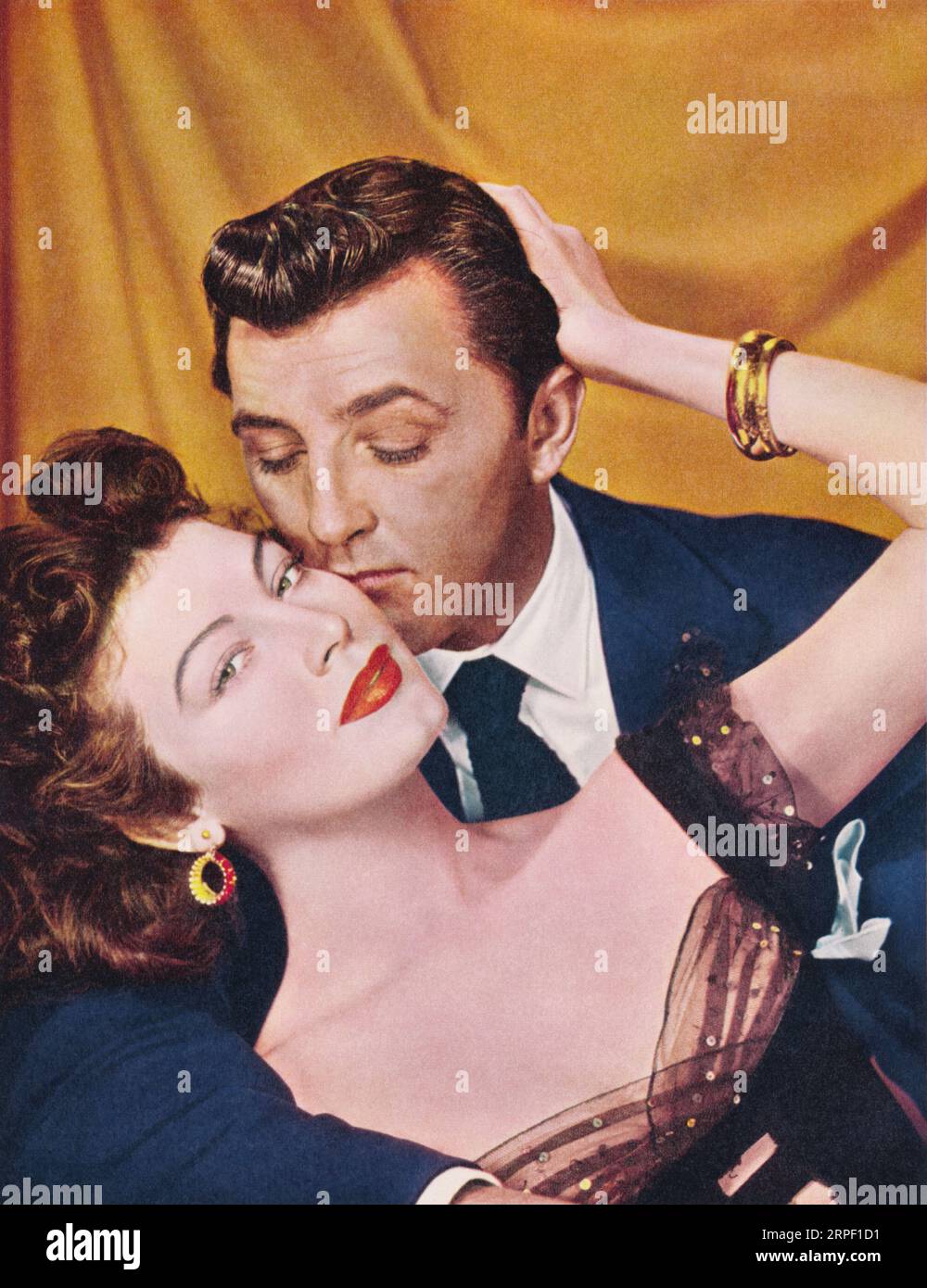 Foto pubblicitaria vintage di Robert Mitchum e Ava Gardner per il film del 1951 My Forbidden Past. Foto Stock