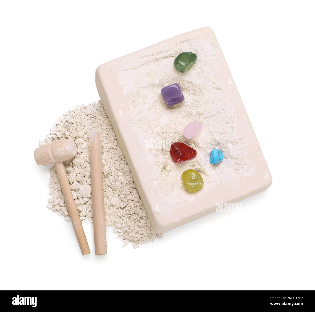 Kit di scavo su sfondo bianco, vista dall'alto. Giocattolo educativo per abilità motorie Foto Stock